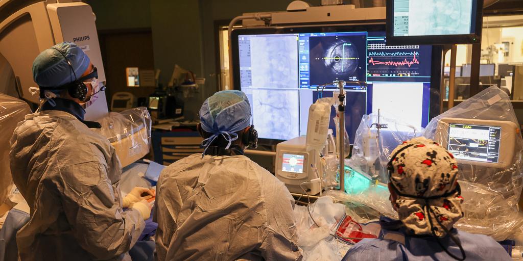 Durham VA makes history as Dr. Gutierrez (left), Dr. Swaminathan (middle), and Kendra Berg, RN (right) mark a milestone with the successful performance of the first renal denervation procedure.